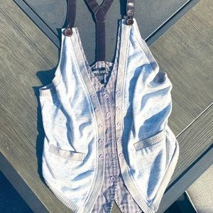 Wet seal vest with faux leather straps